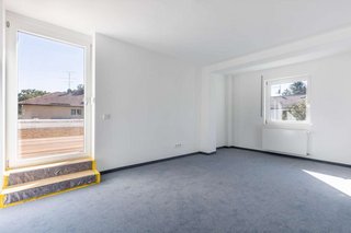 Elternschlafzimmer mit Zugang zur Dachterrasse
