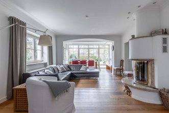 INVEST | Einfamilienhaus mit angrenzender Gewerbefläche in Harlachinger Top-Lage