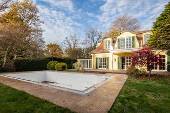 Luxuriöse Ensemble Villa am Isarhochufer mit Außenpool und Tiefgarage